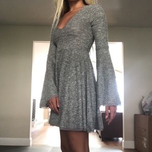 RARE knitted dress with flared sleeves and bottom